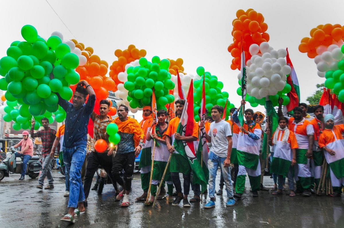 Congress workers during an election campaign in support of party's candidate from Amritsar seat Gurjeet Singh Aujla ahead of the seventh and final phase of the Lok Sabha polls, in Amritsar, Friday, May 17, 2019. (PTI Photo)