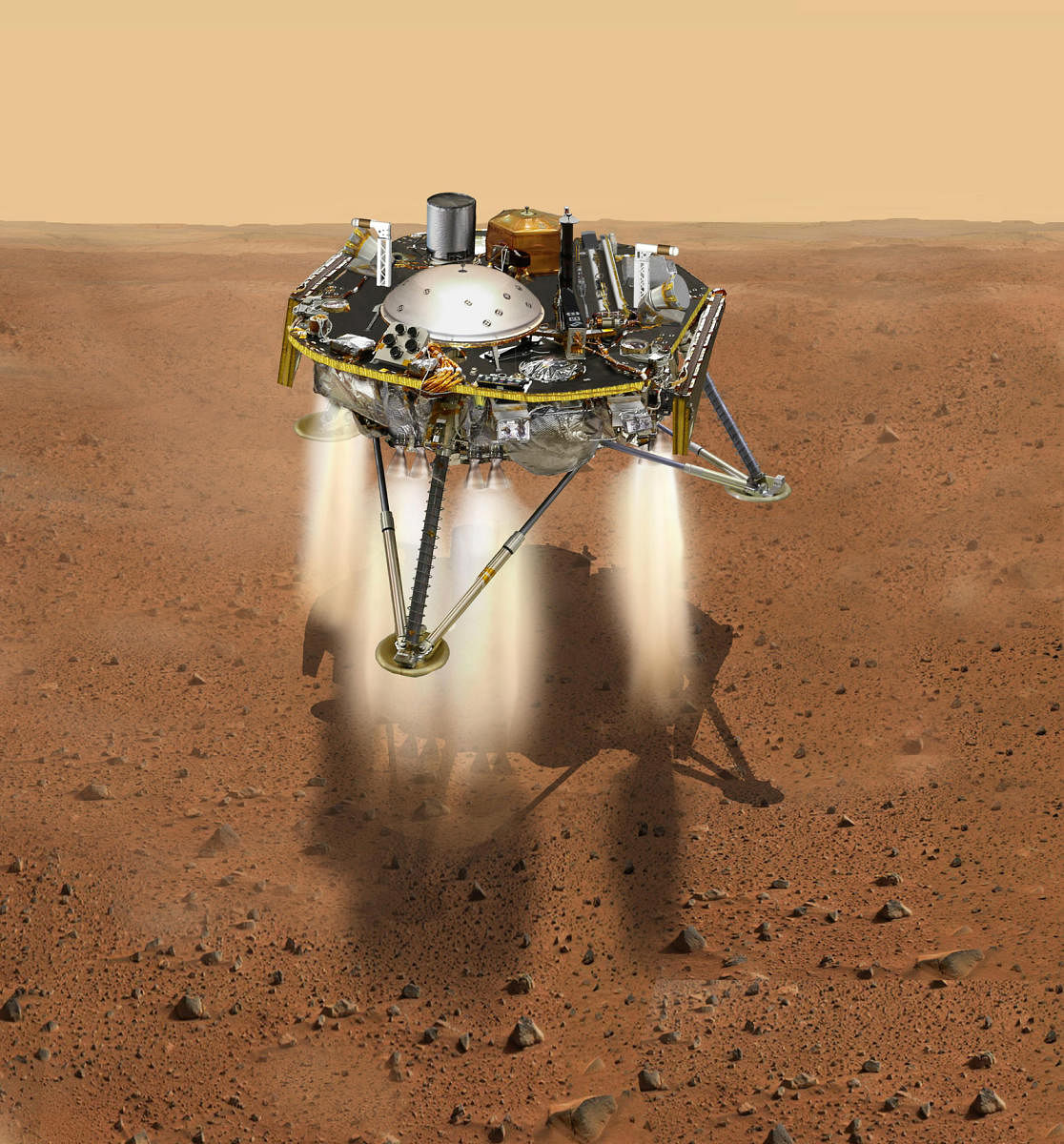 This NASA illustration recieved on November 21, 2018 shows a simulated view of NASA's Interior Exploration using Seismic Investigations, Geodesy and Heat Transport (InSight) lander firing retrorockets to slow down as it descends toward the surface of Mars