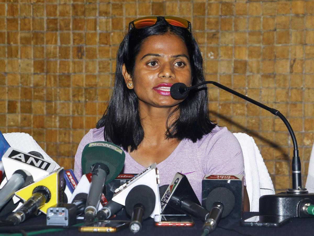 ndian sprinter Dutee Chand addresses a press conference in Bhubaneswar. PTI photo