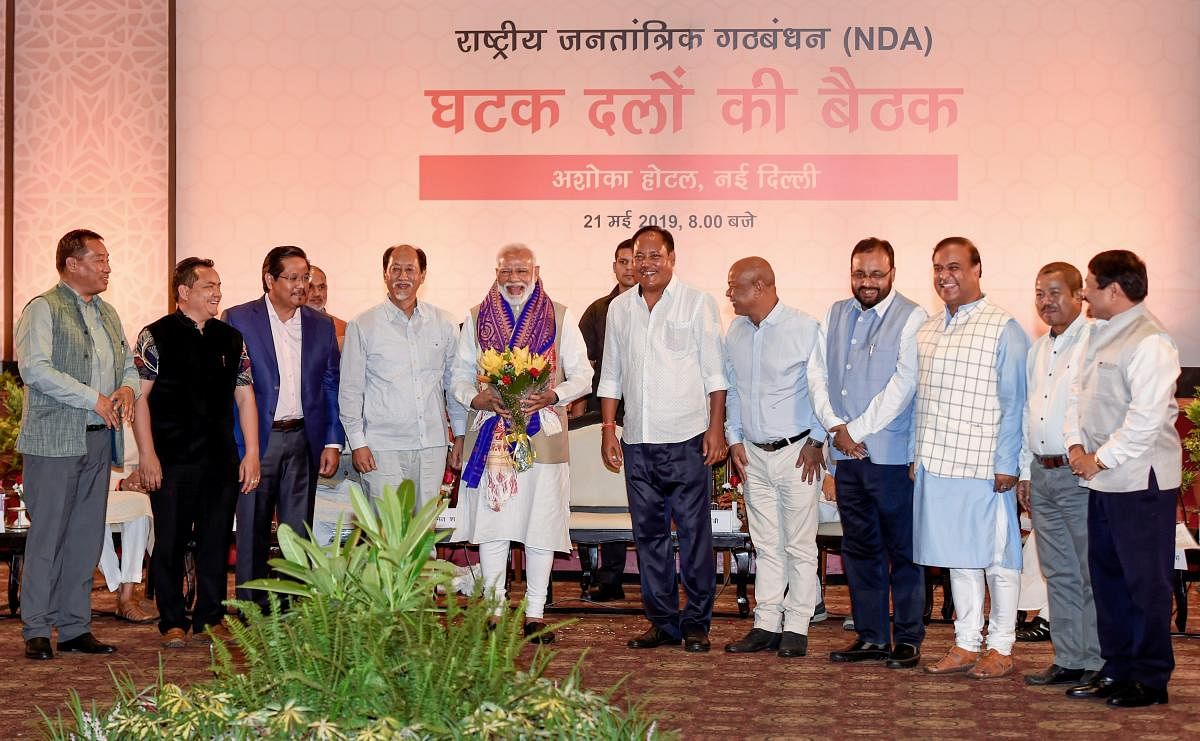 Prime Minister Narendra Modi with National Democratic Alliance leaders from Northeast during a dinner meeting in New Delhi. PTI photo