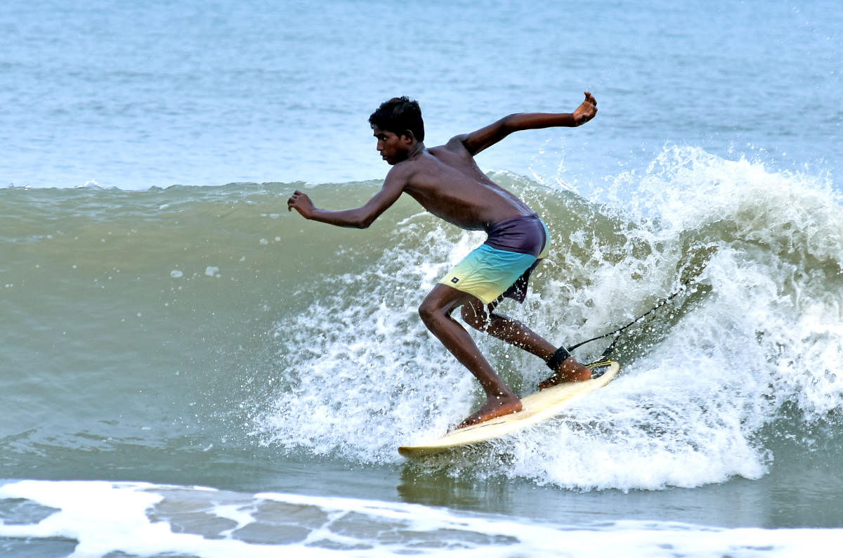 Selva, a young surfer, in action.