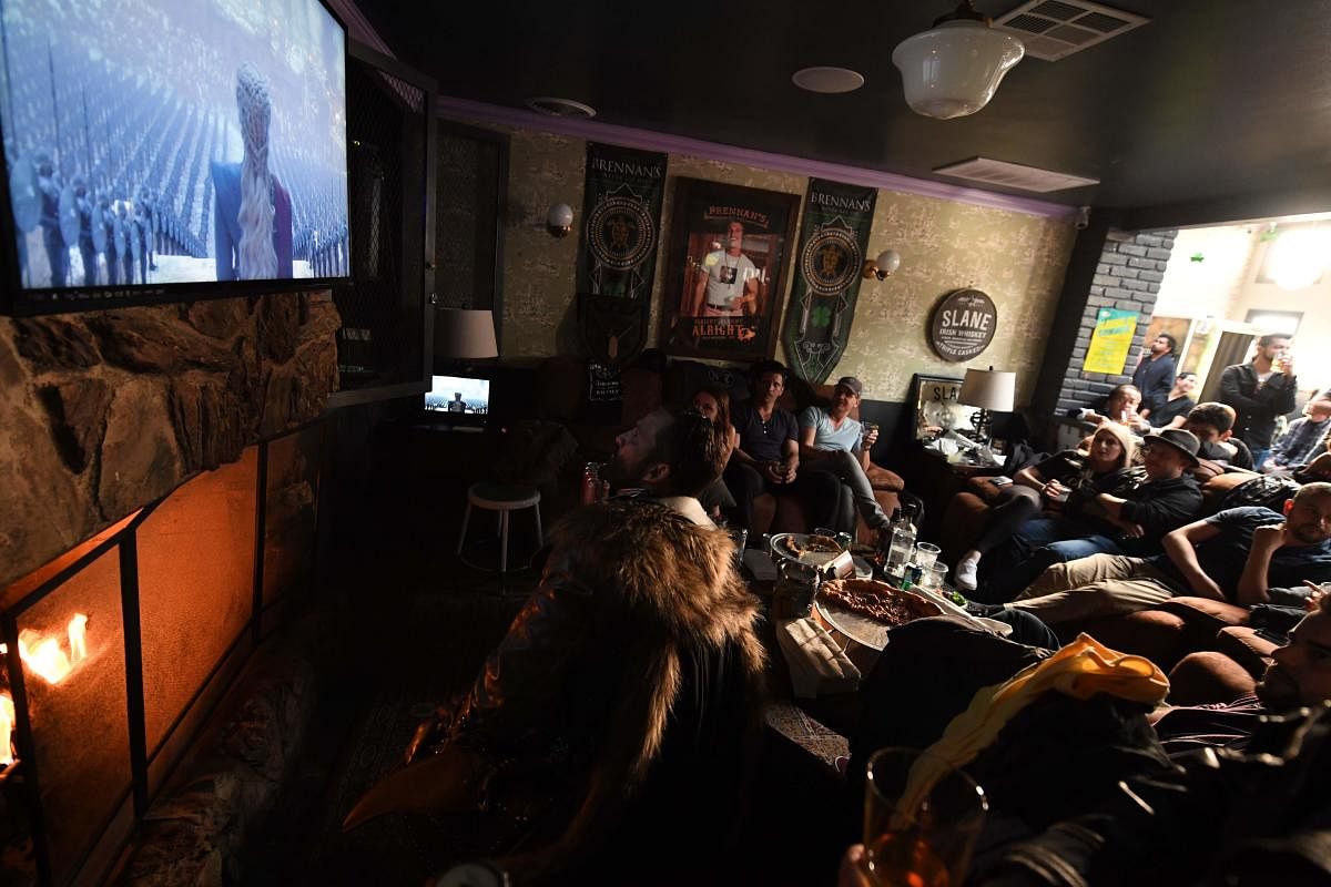 Fans watch HBO's "Game of Thrones" series finale at a viewing party at Brennan's bar in Marina del Rey, California, May 19, 2019. (AFP)