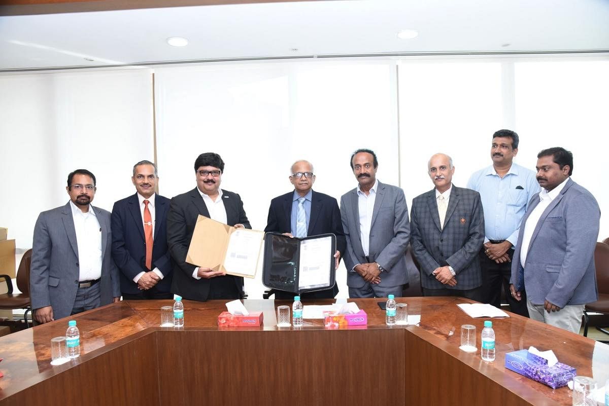 MAHE Vice Chancellor Dr H Vinod Bhat and Toyota Vice President Mr Naveen Soni exchange a memorandum of understanding.
