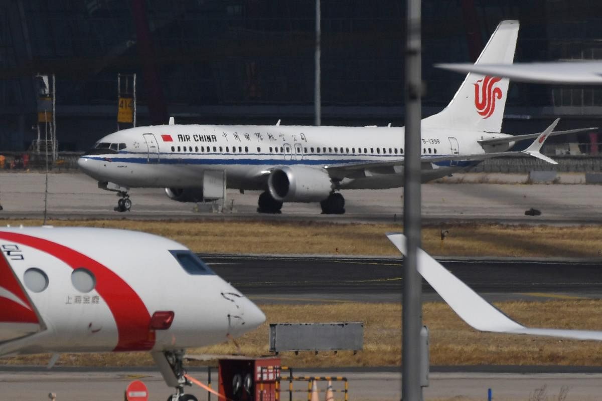 Air China Boeing 737 MAX 8 plane after being grounded at Beijing Capital Airport in Beijing. (AFP Photo)