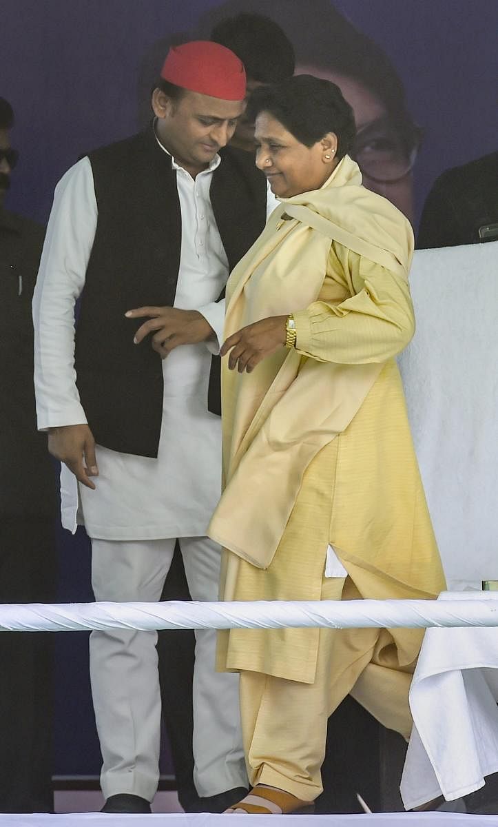 Bahujan Samajwadi Party chief Mayawati with Samajwadi Party chief Akhilesh Yadav at an SP-BSP alliance election rally for Lok Sabha polls. (PTI Photo)