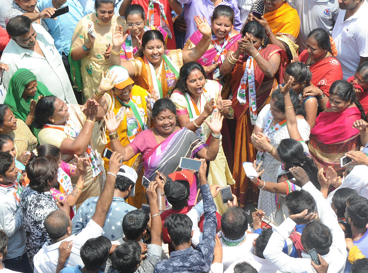 Govindaraj Nagar congress candidate Priyakrishna dancing during the Priyakrishna's election nomination rally. (TPML Photo)