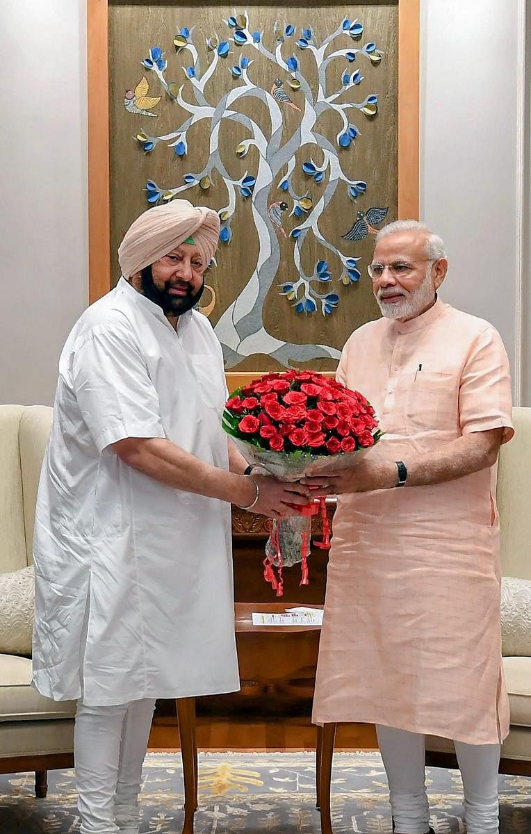 Punjab Chief Minister Capt. Amarinder Singh and Prime Minister Narendra Modi. PTI File photo