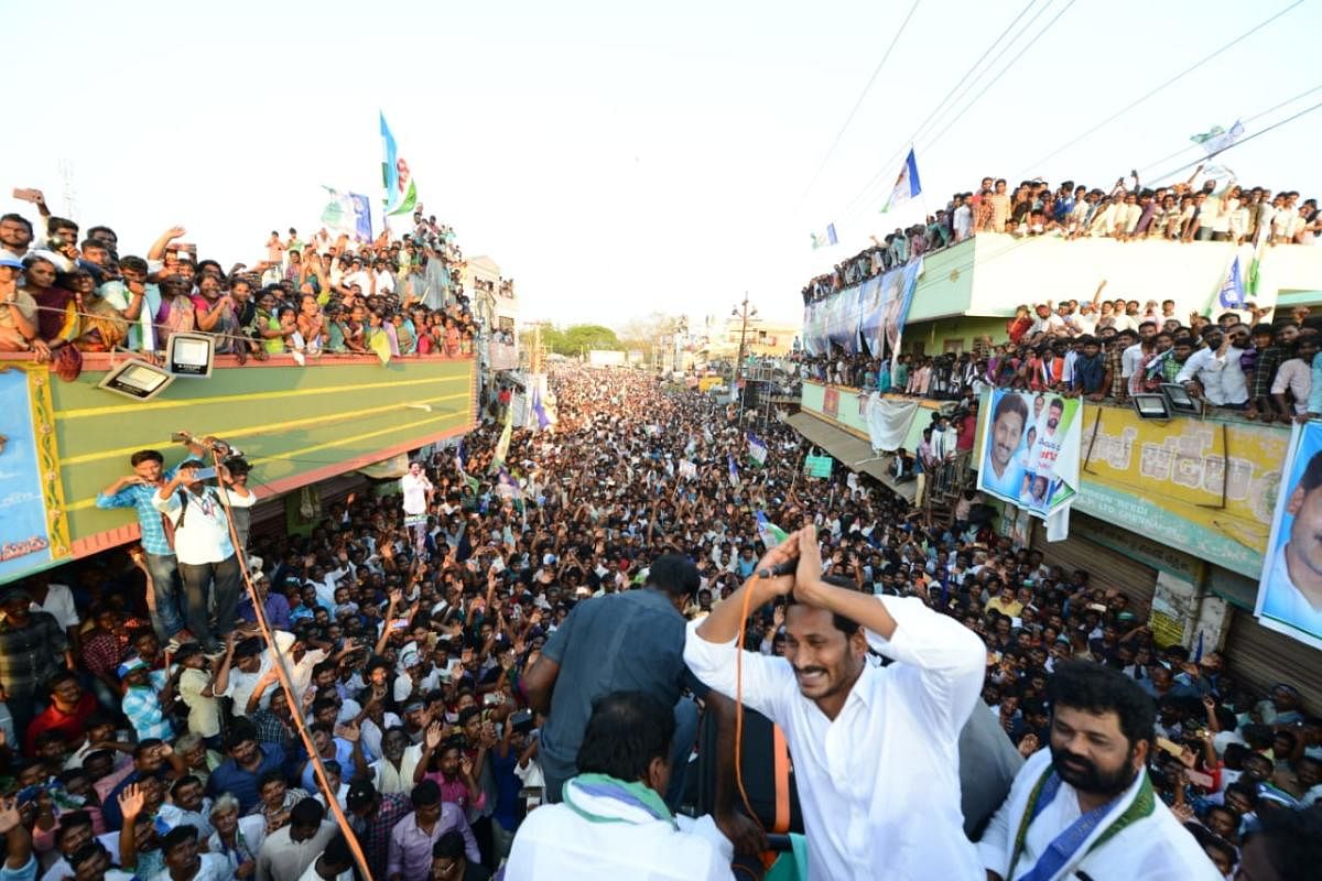Y S Jaganmohan Reddy addressing people at a public meeting during an election road show in coastal Andhra Pradesh.