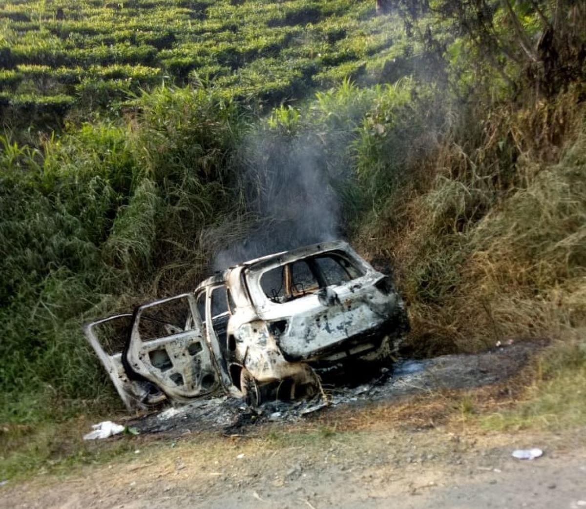 Vehicle of MLA Tirong Aboh torched by militants after the ambush on Tuesday in Tirap district. DH photo