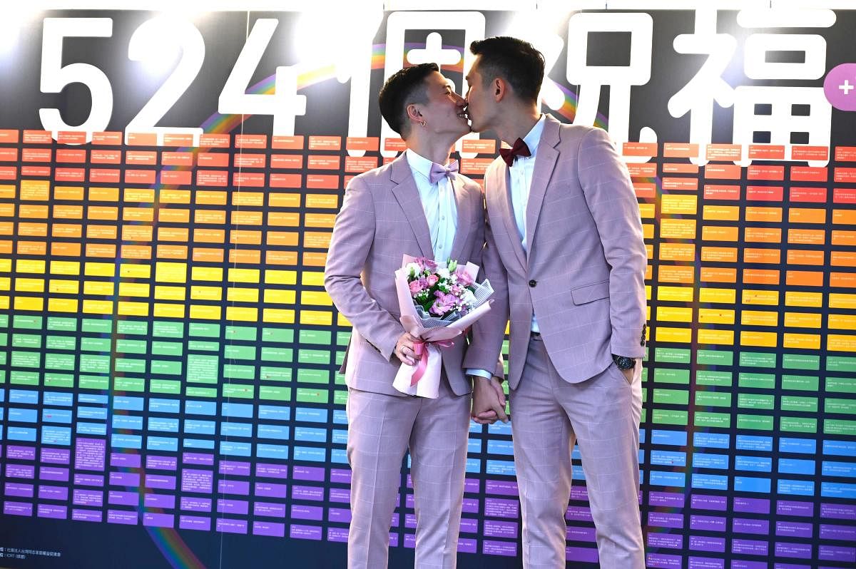 Taiwan's first official same-sex weddings kicked off in a landmark moment for LGBT rights in Asia (Photo by AFP)