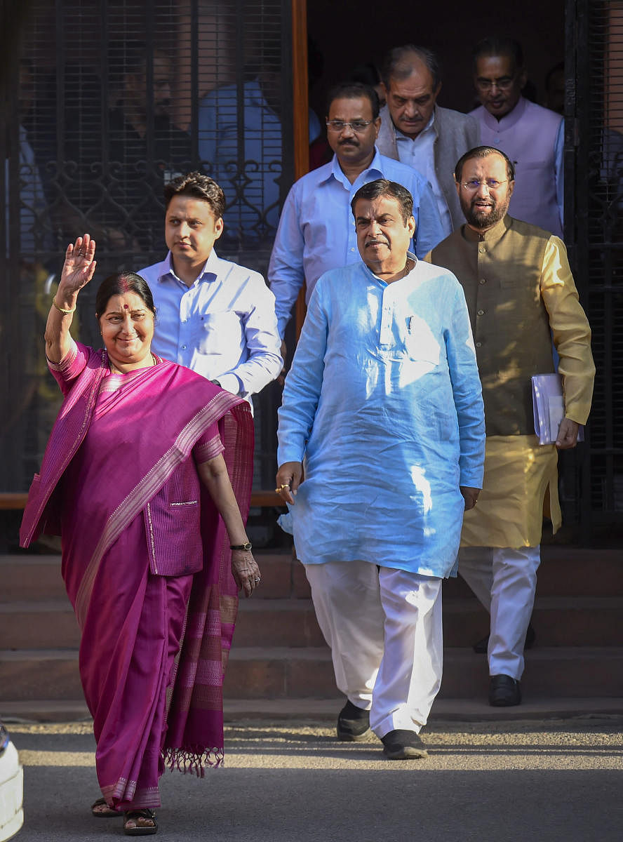 New Delhi: Union Ministers Sushma Swaraj, Nitin Gadkari and Prakash Javedkar leave after the conclusion of the Cabinet meeting, at South Block, in New Delhi, Friday, May 24, 2019. (PTI Photo/Atul Yadav)