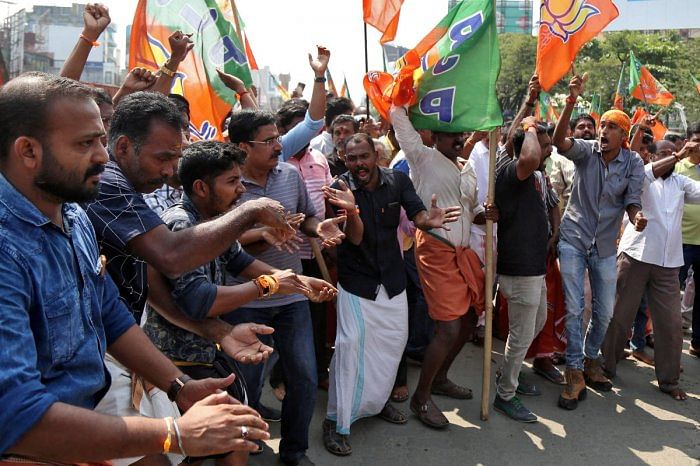 Supporters of India's ruling Bharatiya Janata Party (BJP) shout slogans in Kerala (PTI Photo)