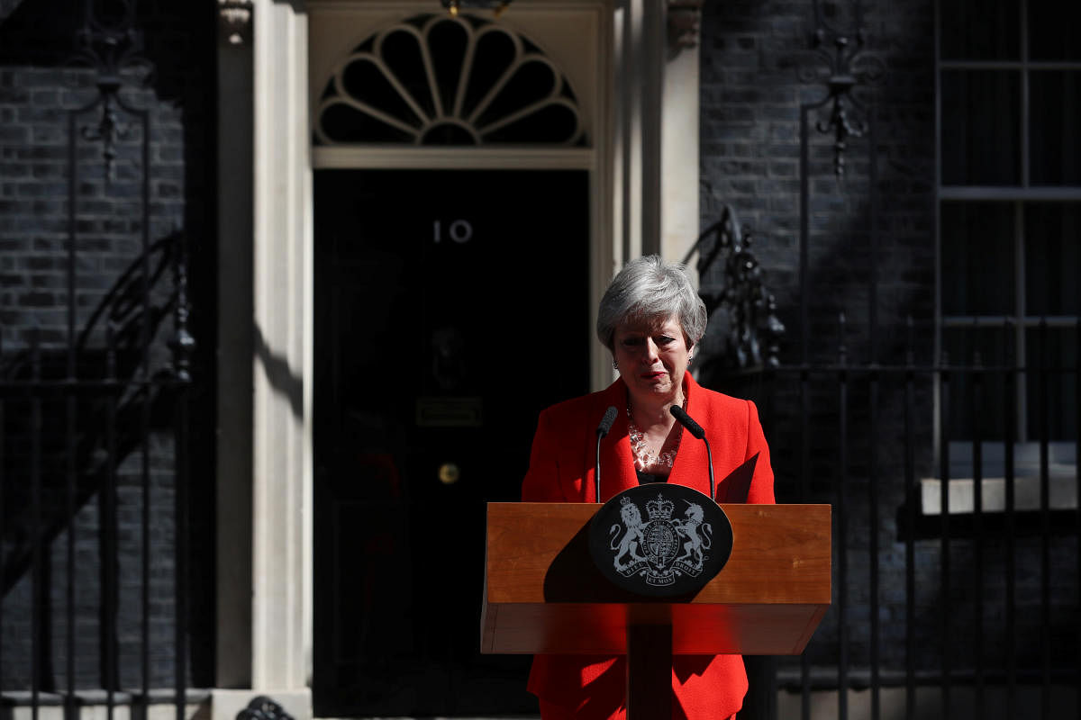 A tearful May announced her resignation on Friday, leaving the Brexit process for exiting the European Union in limbo and raising the risk of Britain crashing out of the bloc in a few months. (Reuters Photo)