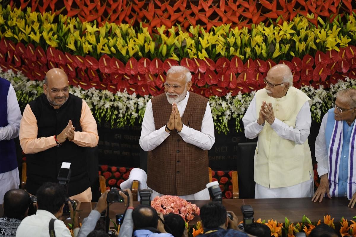 (From left): BJP president Amit Shah, Prime Minister Narendra Modi and senior BJP leaders L K Advani and Murli Manohar Joshi during an NDA meeting at the Central Hall of Parliament in New Delhi on Saturday. AFP