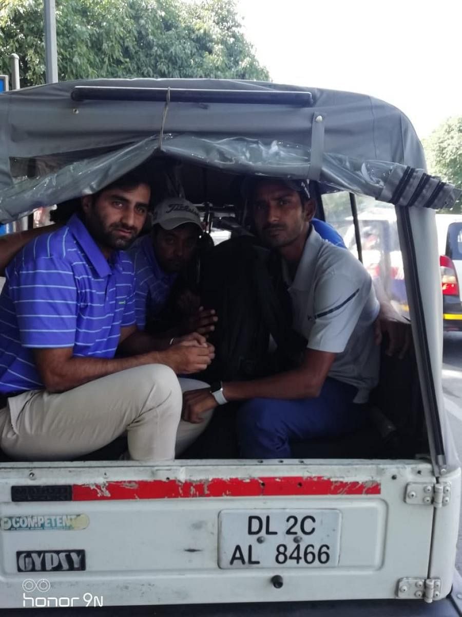 Rashid Khan (right) and fellow golfers been escorted to the police station on Saturday. TWITTER  