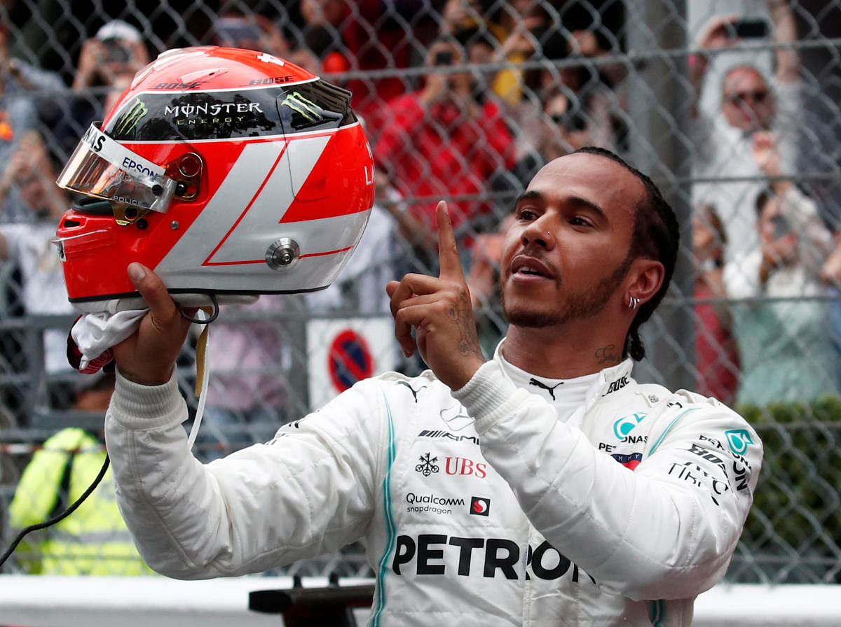 Mercedes' Lewis Hamilton celebrates after winning the Monaco Grand Prix on Sunday REUTERS