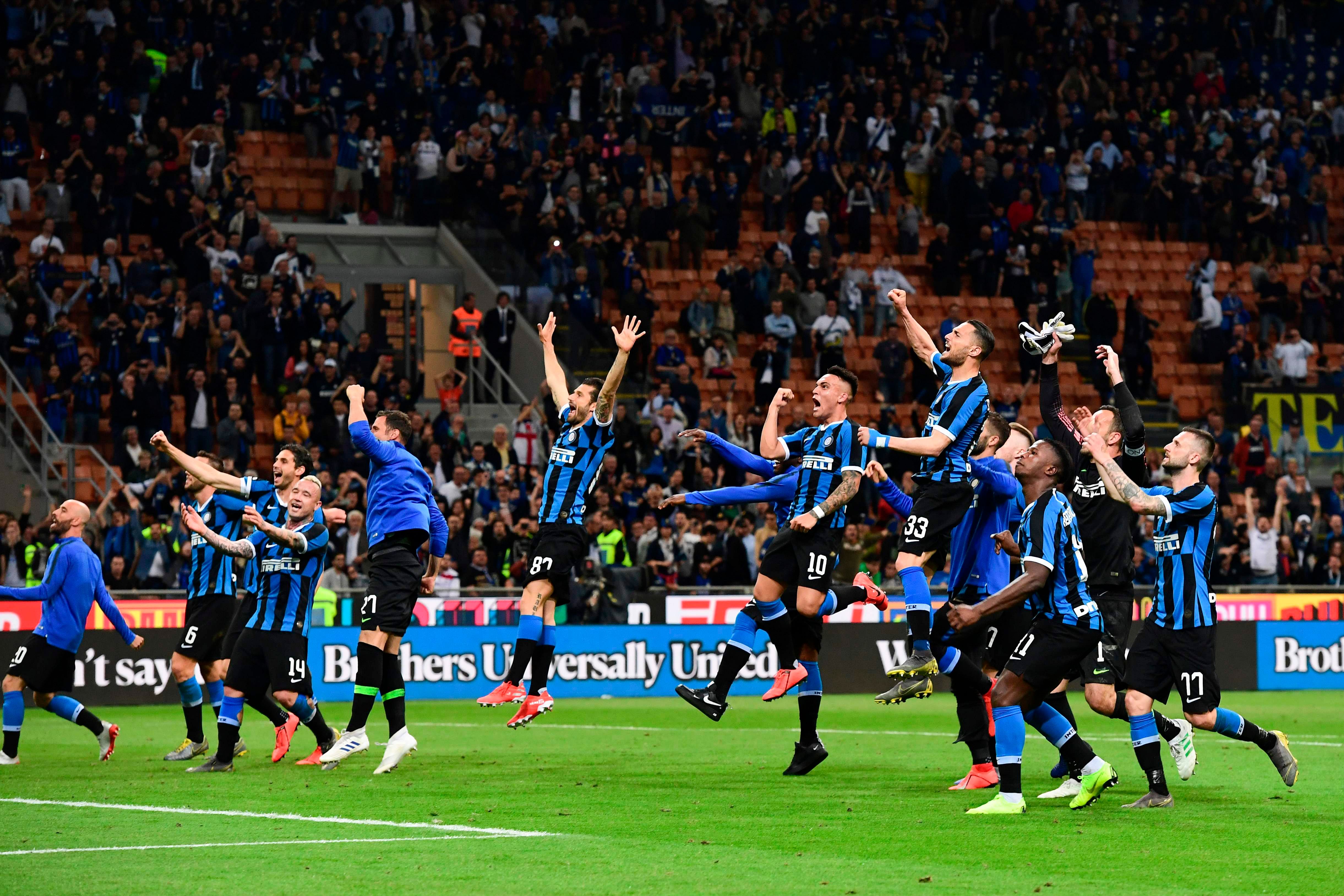 Inter Milan's players celebrate after winning the Italian Serie A football match between Inter Milan and Empoli on May 26, 2019 at the San Siro stadium in Milan. (Photo by AFP)
