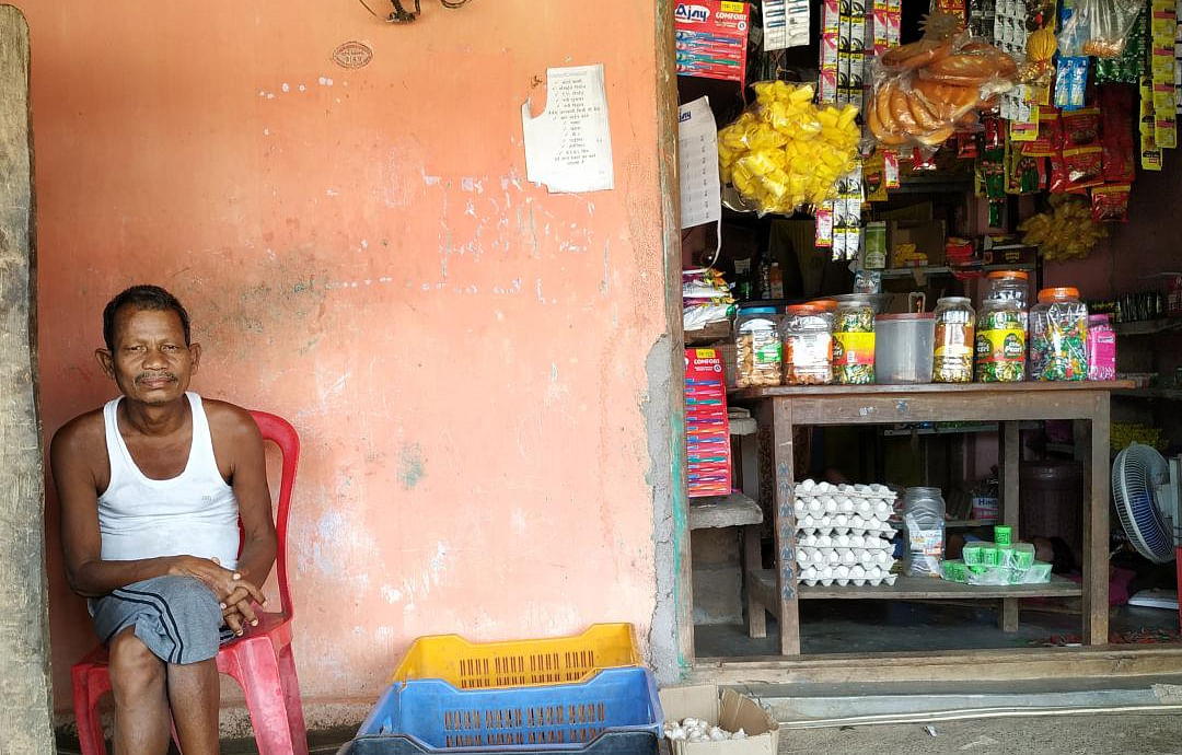 50-year old Aitu Solam sitting in front of his shop at his house in Salwa Judum camp, Dornapal, Sukma (DH File Photo)