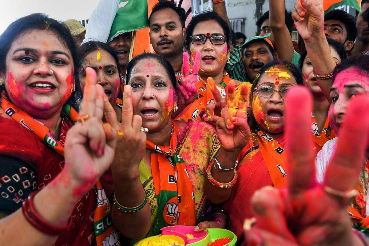 BJP workers celebrate the party's lead on the counting day of 2019 Lok Sabha elections, in Patna. (PTI Photo)