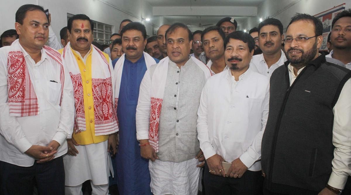 Assam-in-charge Mahendra Singh along with NEDA convener Himanta Biswa Sarma, Asom Gana Parishad (AGP) president Atul Bora, Working President Keshab Mahanta, MP Kamakhya Prasad Tasa, BJP Assam State President Ranjeet Kumar Das pose for a photograph after a