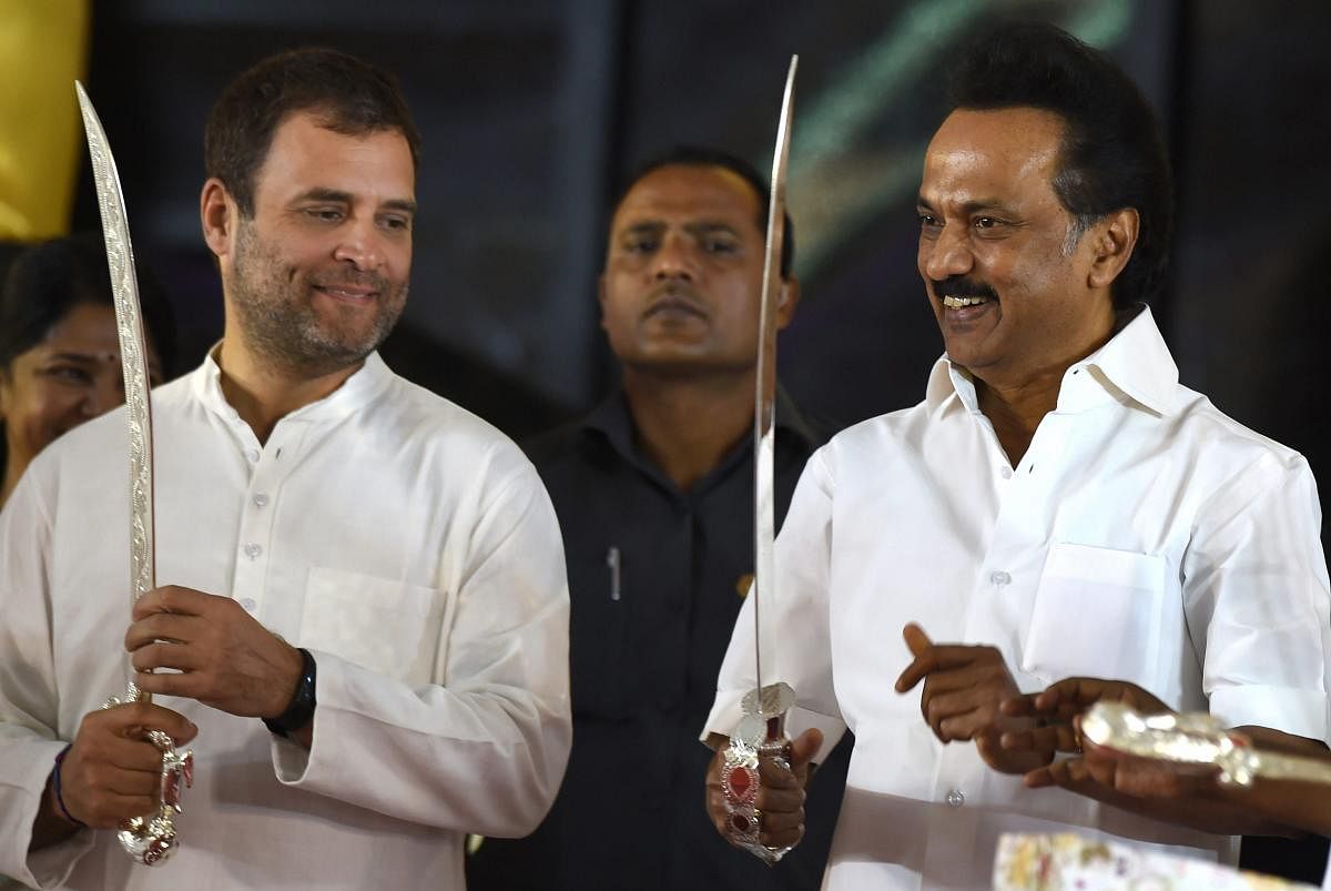 Chennai: Congress President Rahul Gandhi is being presented a sword by DMK president MK Stalin at a public meeting after unveiling a life-size bronze statue of late Chief Minister and DMK President M Karunanidhi at YMCA ground, in Chennai, Sunday, Dec.16,