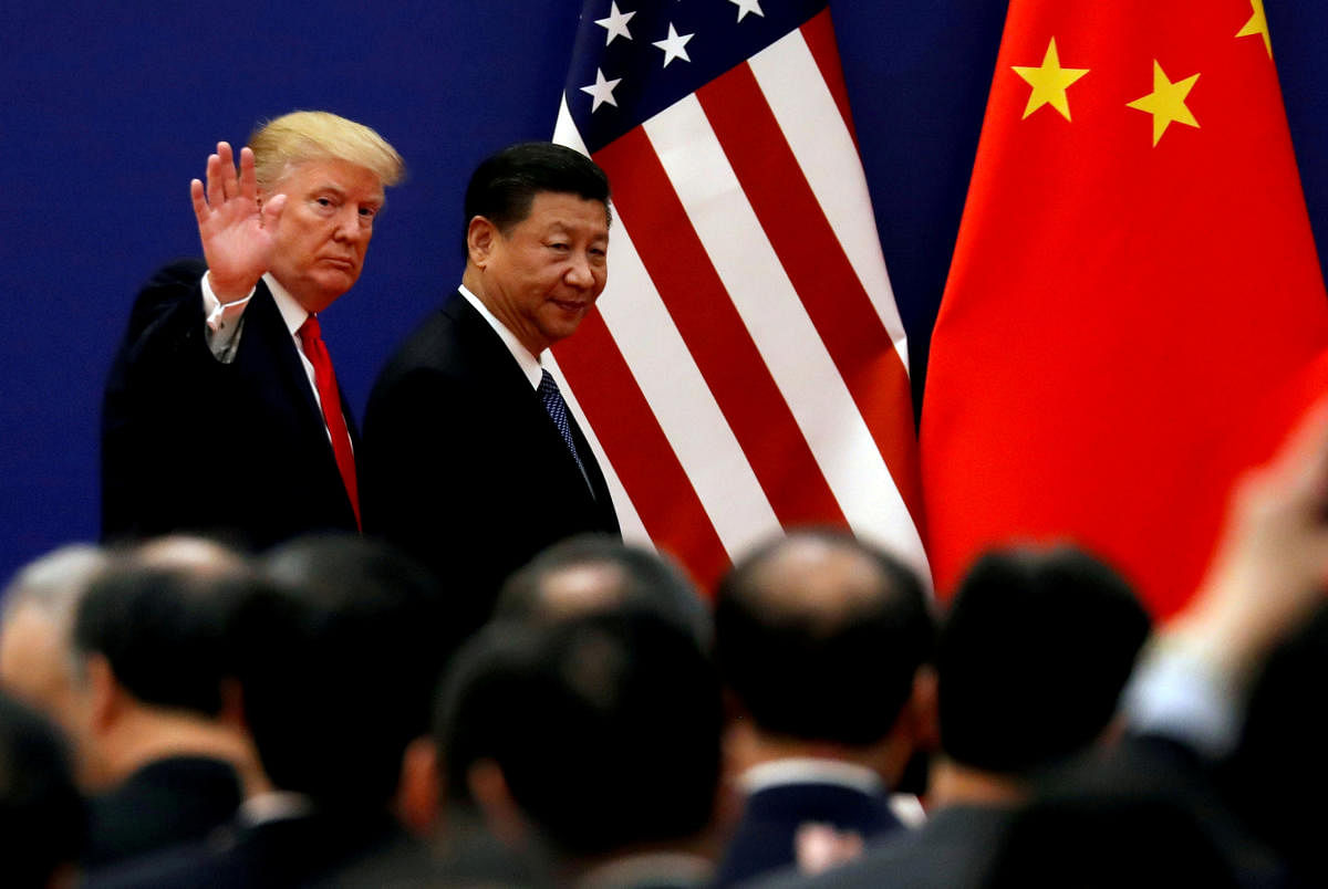 U.S. President Donald Trump and China's President Xi Jinping. Photo: REUTERS