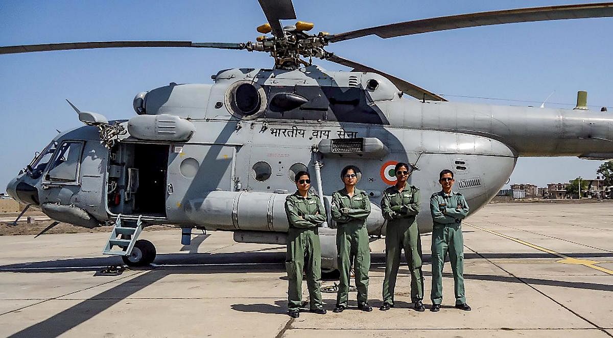 light Lieutenant Parul Bhardwaj (Captain), Flying Officer Aman Nidhi (Co-pilot) in the centre, Flight Lieutenant Hina Jaiswal (Flight Engineer), extreme left, and Squadron Leader Richa Adhikari (Engineering Officer) extreme right who became country’s first ‘All Women Crew’ to fly a Mi-17 V5 helicopter in the IAF. The ‘All women crew’ flew a Mi-17 V5 helicopter for a Battle Inoculation Training mission taking off and landing from restricted areas at a forward air base in South Western Air Command. PTI Photo