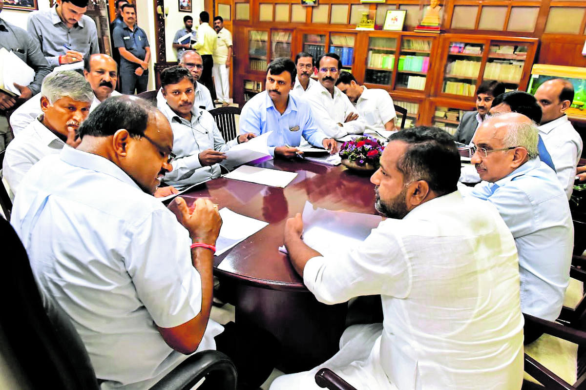 Chief Minister H D Kumaraswamy chairs a meeting to discuss the water crisis in Dakshina Kannada on Monday.