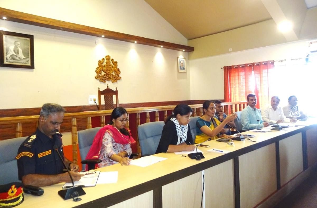 Deputy Commissioner Annies Kanmani Joy speaks during a preparatory meeting at her office in Madikeri on Tuesday.