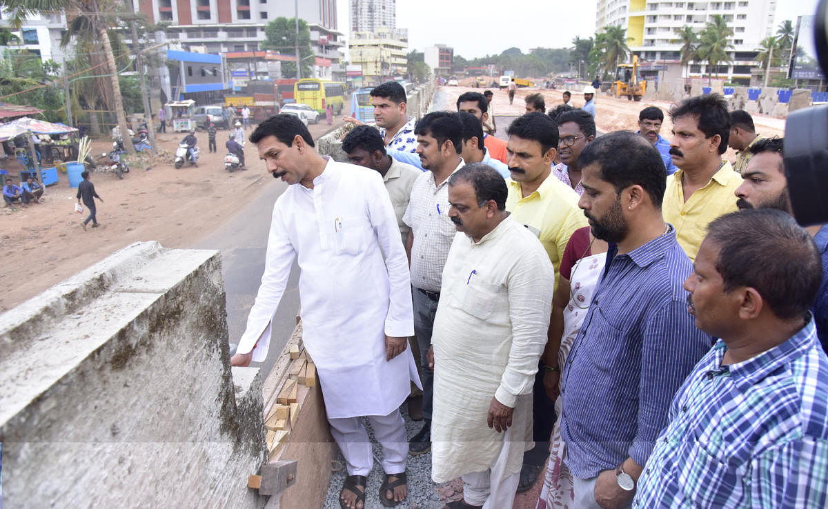 Dakshina Kannada MP Nalin Kumar Kateel inspects the ongoing work at the site of the Pumpwell (Mahaveer) flyover in Mangaluru on Wednesday.