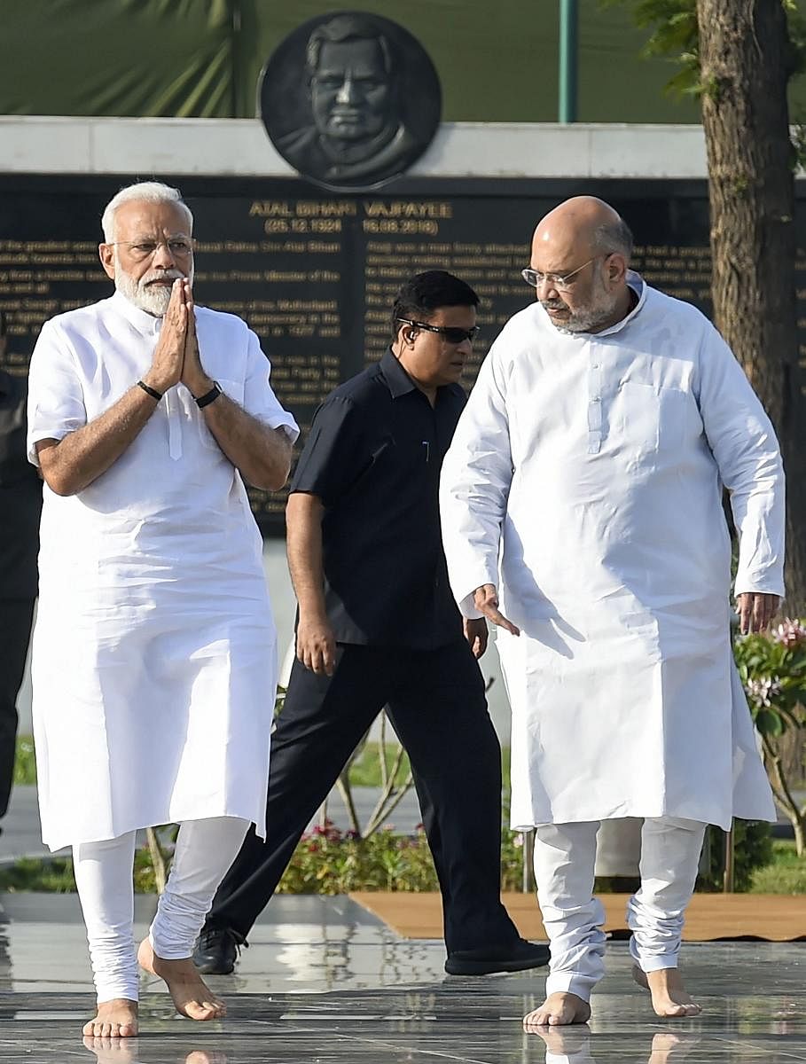 Prime Minister Narendra Modi and BJP President Amit Shah arrive to pay tribute to BJP veteran late Atal Bihari Vajpayee at Sadaiv Atal Samadhi (PTI Photo)