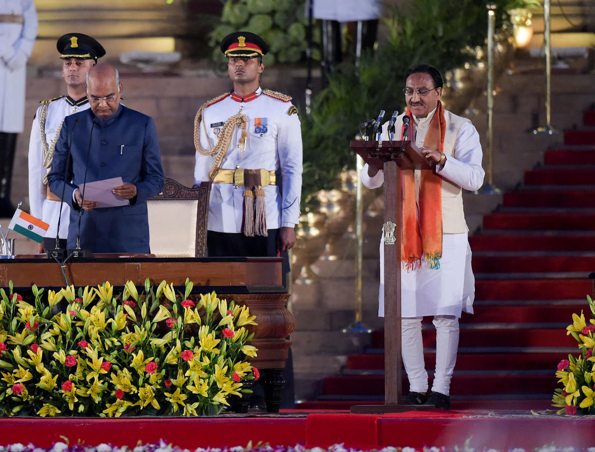  Ramesh Pokhriyal 'Nishank' being sworn-in as a Cabinet minister by President Ram Nath Kovind during the swearing-in ceremony at the forecourt of Rashtrapati Bhawan in New Delhi. PTI photo