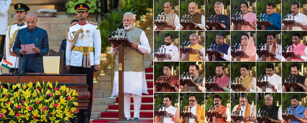 President Ram Nath Kovind administering oath of office and secrecy to Prime Minister Narendra Modi and his Cabinet ministers during the swearing-in ceremony at the forecourt of Rashtrapati Bhawan in New Delhi on Thursday. PTI file photo