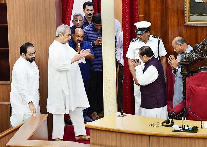 Odisha Chief Minister Naveen Patnaik greets six-time MLA of Biju Janata Dal Surya Narayan Patra after he was elected as the 22nd speaker of Odisha Legislative Assembly, in Bhubaneswar. (PTI Photo)