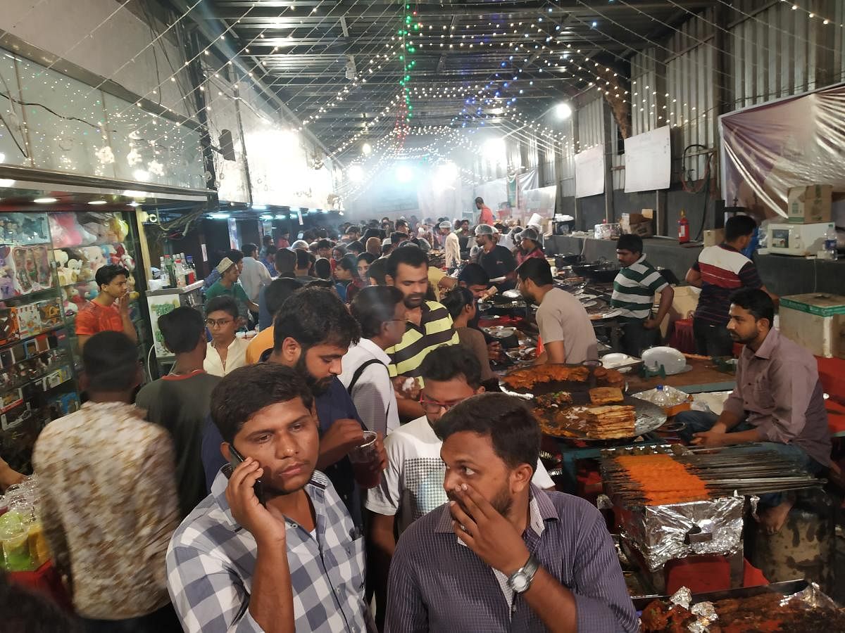 Visitors throng the Iftaar stalls at Koramangala.