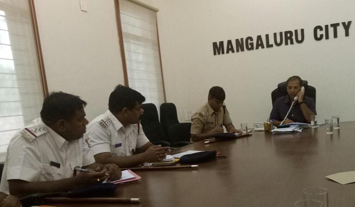 City Police Commissioner Sandip Patil receives a call during the weekly phone-in programme on Friday.