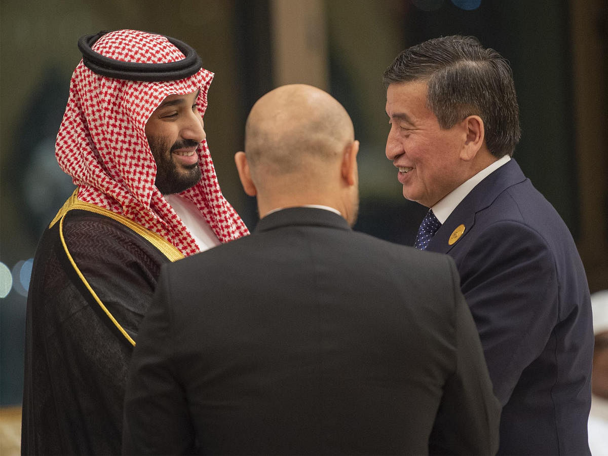 This handout photo released by the Saudi Royal Palace shows Crown Prince Mohammed bin Salman(L) of Saudi Arabia welcoming Kyrgyz President Sooronbay Jeenbekov (R) during a summit meeting of the 57-member Organization of Islamic Cooperation (OIC) in the Sa