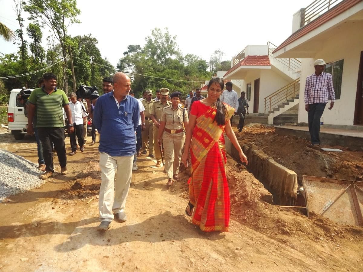 District In-charge Minister Sa Ra Mahesh inspects the ongoing work on houses for natural calamity victims with Deputy Commissioner Annies Kanmani Joy and Superintendent of Police Dr Suman D Pennekar in Madikeri.