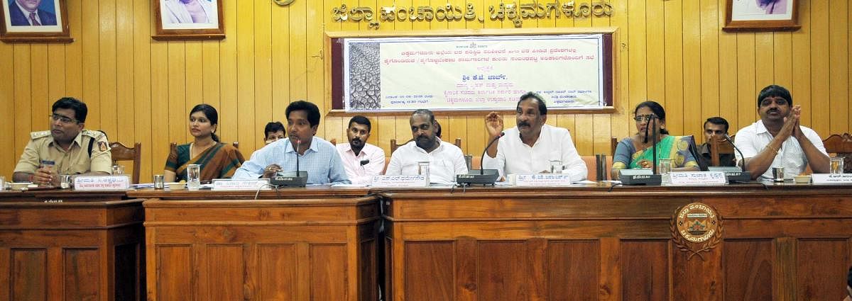 District In-charge Minister K J George chairs a review meeting in Chikkamagaluru on Saturday.