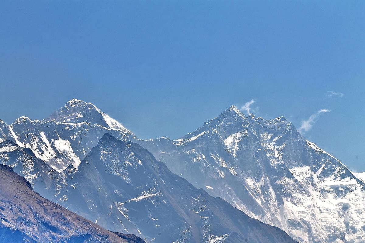 Mt. Everest towards left and Mt. Lhotse towards right and south col in between; as seen from hill above Kunde village.