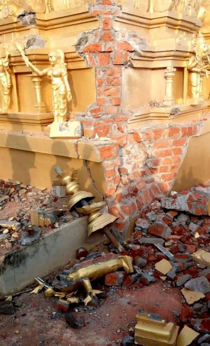 The gopuram of Lakshmi Janardhan Swamy Temple at Hosahudya in Chikkaballapur taluk was damaged in lightning strike on Friday night. (Right) A house at Mangalgi in Kalagi taluk of Kalaburagi district collapsed following showers in the wee hours of Saturday