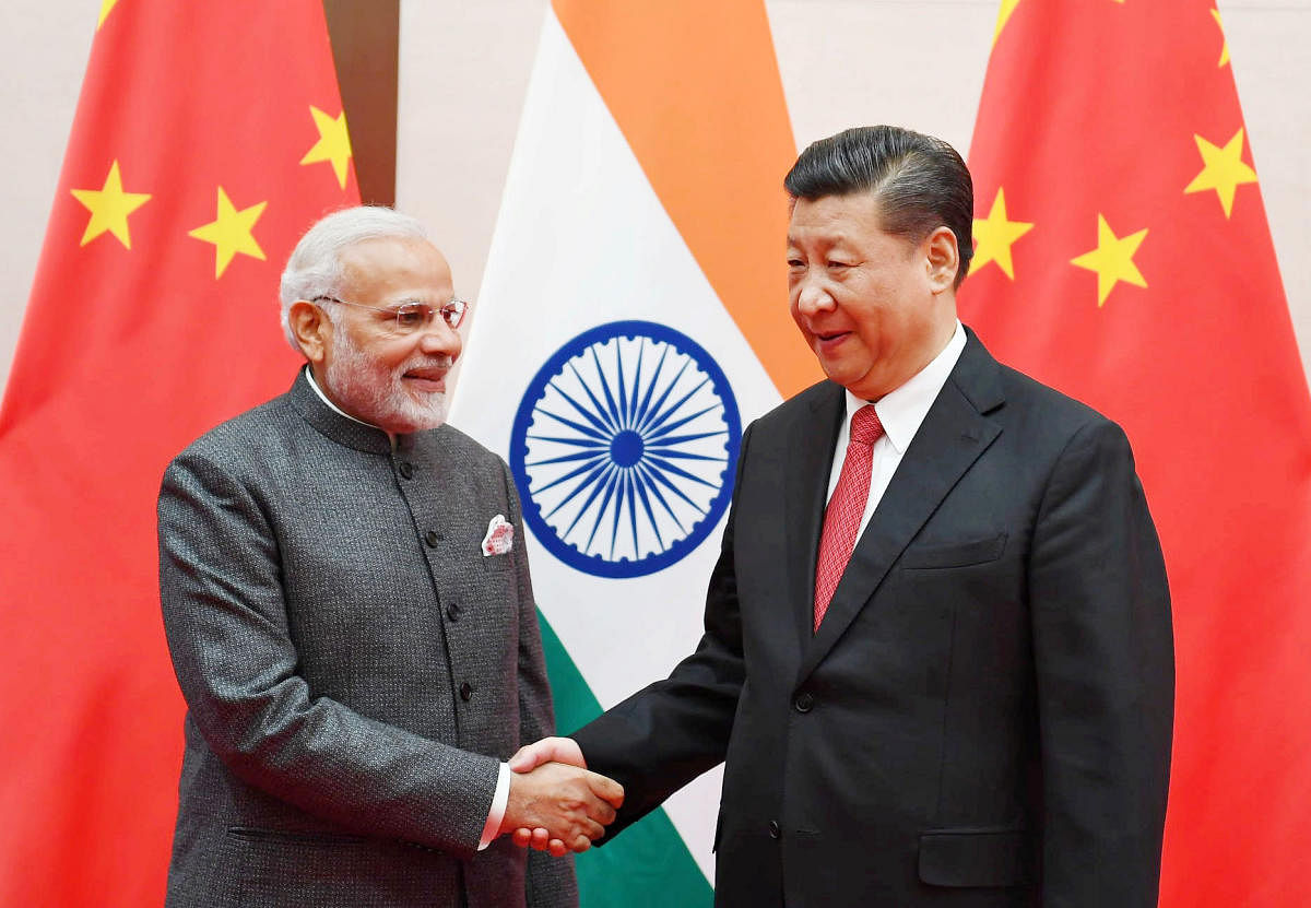 New Delhi apparently dropped the phrases to avoid upsetting Beijing and to avoid any hiccup in the process Modi and Chinese President Xi Jinping initiated during an “informal summit” at Wuhan in central China in April 2018 to mend the bilateral ties. (Reuters File Photo)