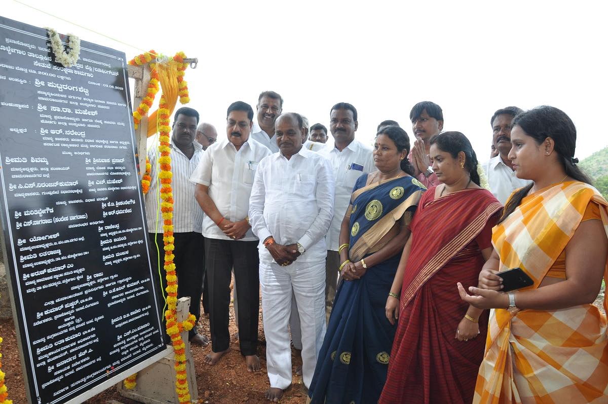 District in-charge Minister C Puttarangashetty inaugurates renovation works of Wellesley Bridge in Kollegal taluk on Monday.