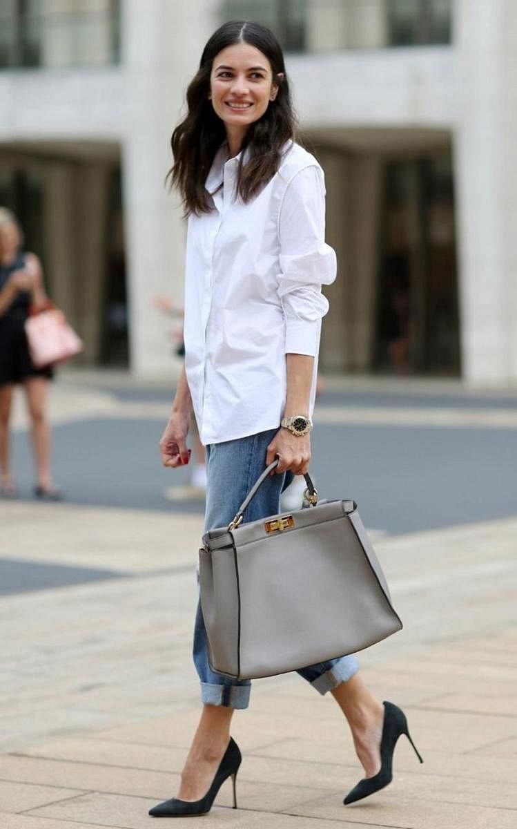 A crisp white shirt is a timeless pick in any material that flatters you.