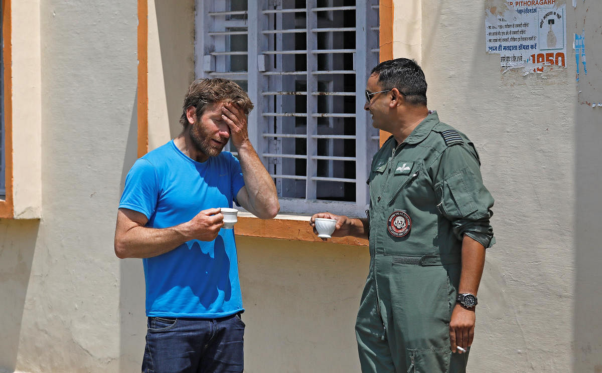 British climber and expeditions deputy leader, Mark Thomas reacts as he talks to an Indian Air Force pilot in Pithoragarh town, in the Himalayan state of Uttarakhand, India. June 4, 2019 Reuters. 