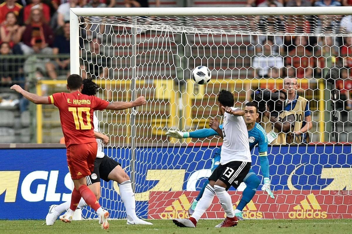 In fine touch: Eden Hazard (left) scores Belgium second goal during their international friendly football match against Egypt. AFP