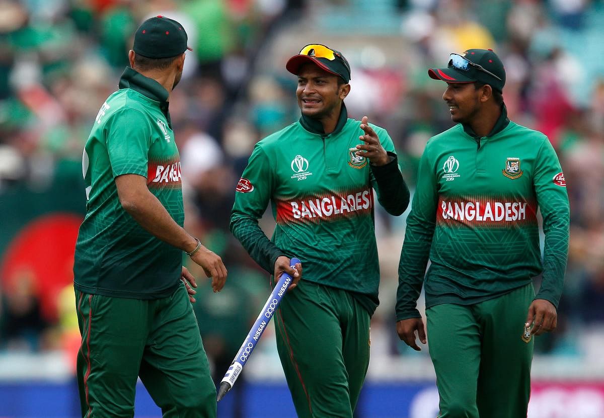 Bangladesh's players including Shakib Al Hasan (C) celebrate after victory over South Africa by 21 runs after the 2019 Cricket World Cup group stage match between South Africa and Bangladesh at The Oval in London on June 2, 2019. (AFP)