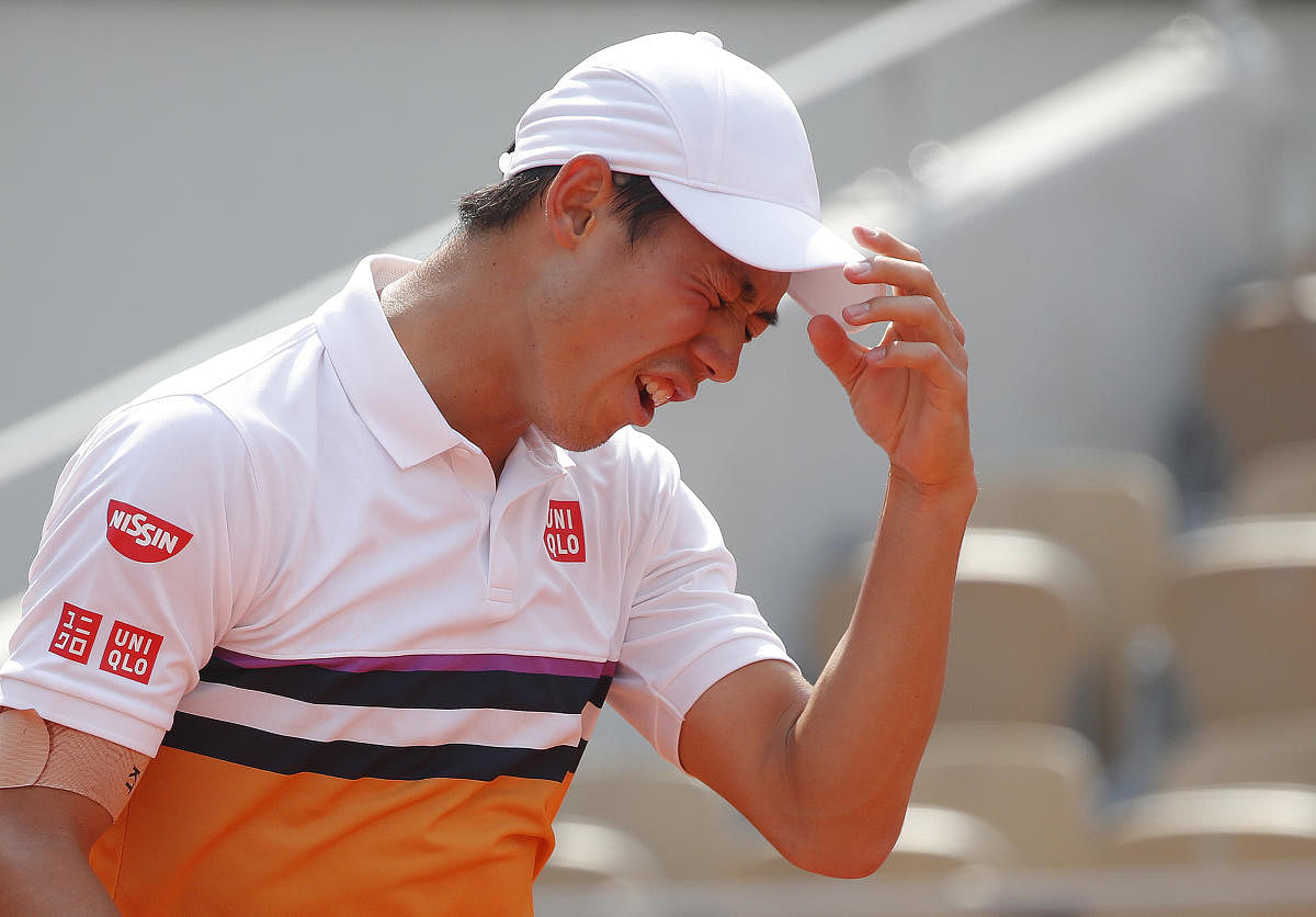 HARD TASK Japan's Kei Nishikori had a torrid time facing Spain's Rafael Nadal in the French Open quarterfinal on Tuesday. Reuters 