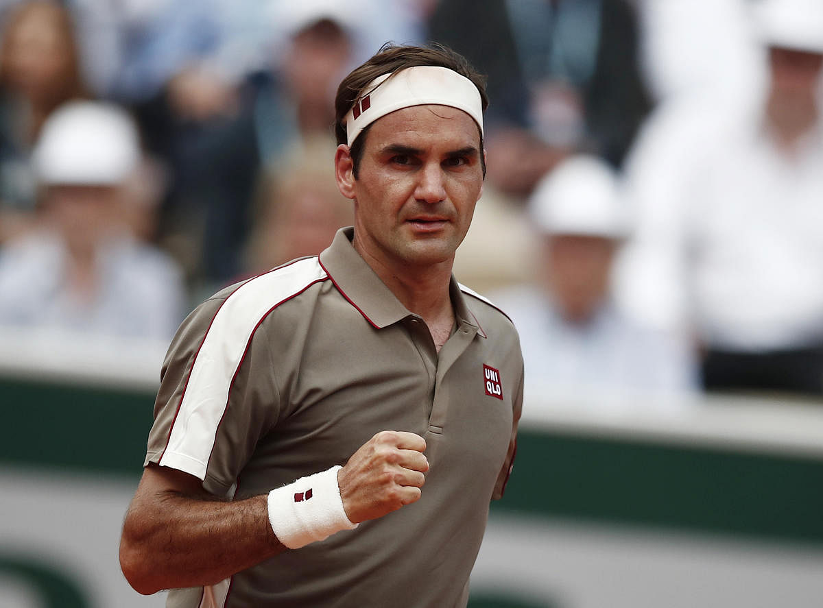 CLASH OF GIANTS: Switzerland's Roger Federer faces a huge task when he faces his arch-rival and clay court King Rafael Nadal of Spain in the French Open semifinal on Friday. REUTERS 
