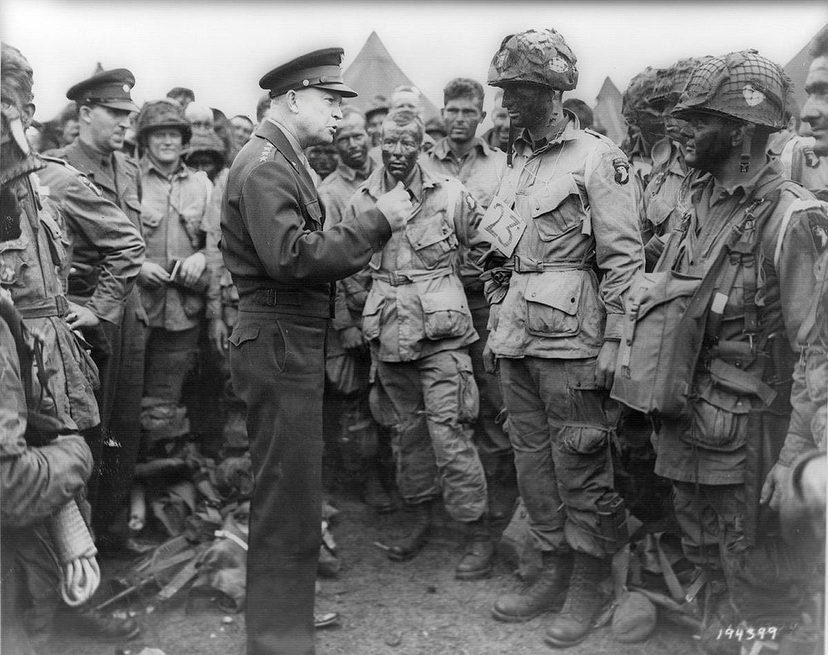 Allied forces Supreme Commander General Dwight D. Eisenhower speaks with U.S. Army paratroopers of Easy Company, 502nd Parachute Infantry Regiment (Strike) of the 101st Airborne Division, at Greenham Common Airfield in England June 5, 1944 in this handout